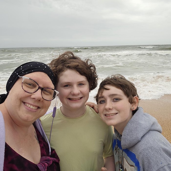 A Lone Warrior mom and her two children at the beach